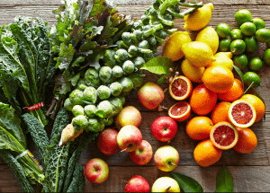 a group of fruits and vegetables on a wood surface Healthy Weight Loss Diets Southend